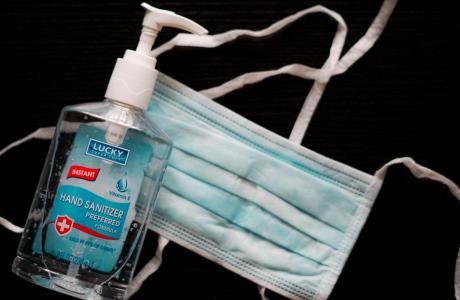 hand sanitizer and mask